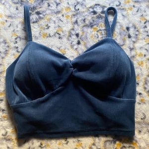 Blue crop top, velvet material. Really cute just never worn